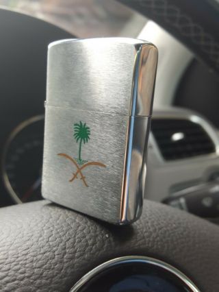 Zippo Lighter With Green Palm Tree And Gold Crossed Swords Graphics On The Front