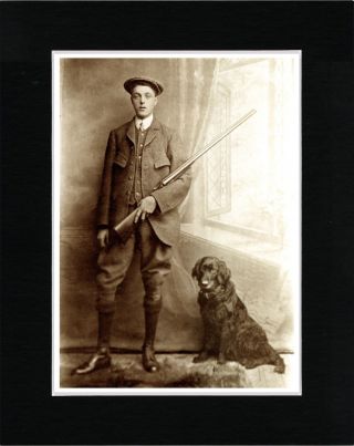 Man With Gun And Flat Coated Retriever Vintage Style Dog Photo Print Matted