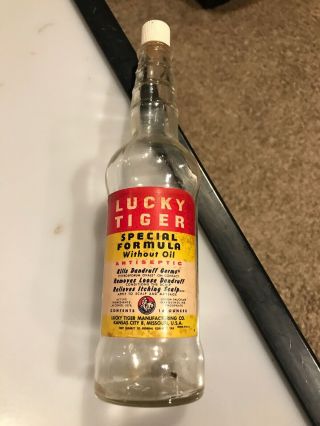 Vintage Lucky Tiger Dandruff Co.  Barber Bottle With Lid