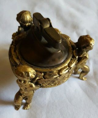 Vintage Gold Brass Table Top Cigarette Lighter 3 Cherub Theme Cherubs