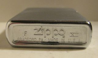 1996 BRUSHED CHROME ZIPPO WITH INSERT 2