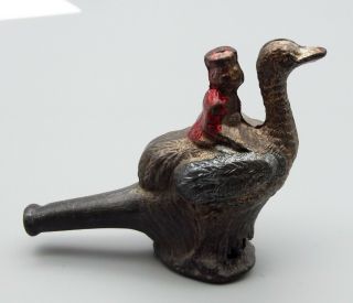 Antique Metal Bird Whistle Toy Boy Riding Ostrich Cast Metal Figural Vtg