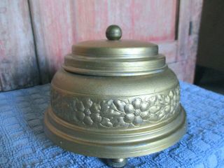 Vintage Tin Gold Tone Powder Puff Round Music Box With Legs And Lid Dated 1942