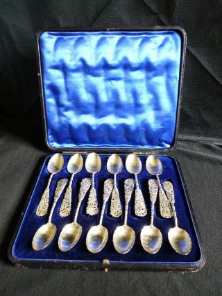 A Cased Set Of 12 Chinese Sterling Silver Spoons