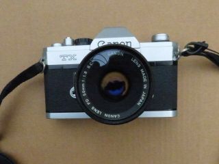 Vintage Canon Tx 35mm Slr Camera With A Canon 50mm F1:1.  8 Lens