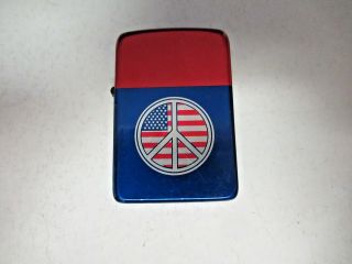 Storm King Lighter Red And Blue With American Flag Peace Sign On The Front