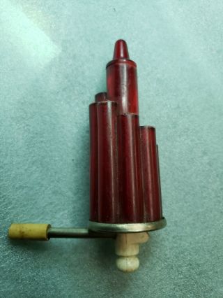 Vintage Red Plastic Music Instrument