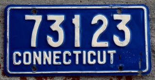 1957 Blue On White Connecticut License Plate With The Tab Slots