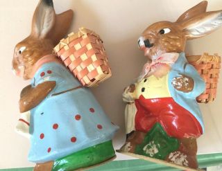 2 Vtg Easter Rabbits Made In Germany.  Hand Painted.  Handwoven Baskets On Back
