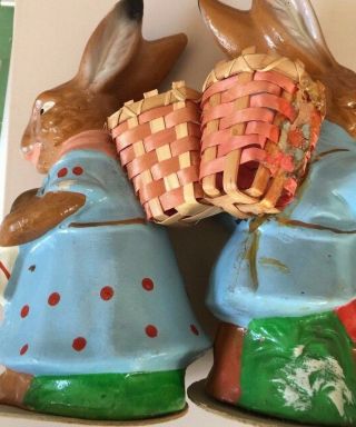 2 Vtg Easter Rabbits made in Germany.  Hand painted.  Handwoven baskets on back 2