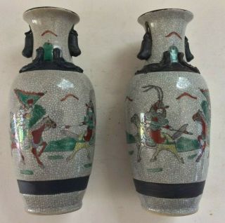 Pair Seal Marked Chinese Nanking Porcelain Crackle Glaze Warrior Motif Vases