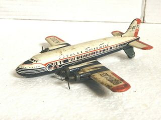 Vintage Douglas DC - 7C Tin Toy Airplane Seven Seas 3