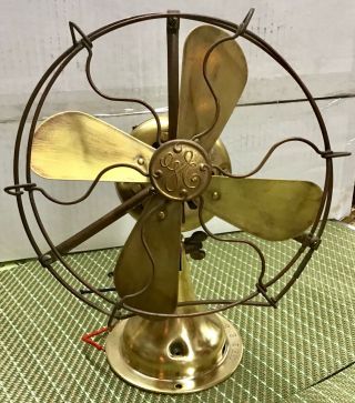 Antique All Brass Ge 9 In Whiz Fan With Brass Blades Brass Cage And Brass Body.