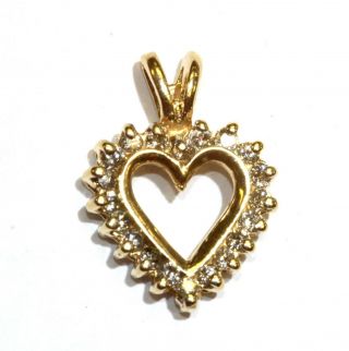 10k Yellow Gold.  21ct Si1 H Round Diamond Heart Pendant 1.  2g Estate Vintage
