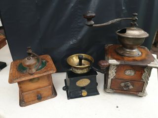 Set Of 3 Vintage Antique Cast Iron And Wooden Coffee Grinders.