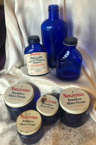 7 Vtg Cobalt Blue Glass:4 Noxzema Jars,  3 Bottles,  1 W/1961 Milk Of Magnesia Label