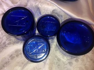 7 vtg cobalt blue glass:4 Noxzema jars,  3 bottles,  1 w/1961 Milk of Magnesia label 3