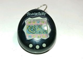 Vintage 1997 Tamagotchi Solid Black Silver Virtual Pet Bandai,
