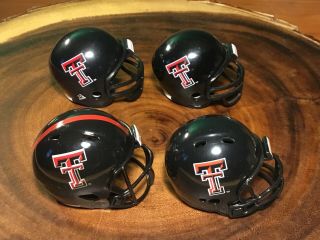 (4) Riddell Pocket Pro Football Helmets (texas Tech Red Raiders)