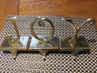Set Of 3 Vintage Brass J.  O.  Y.  Christmas Stocking Hanger Holders W/mantel Hook