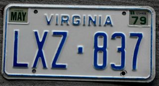 6 - Digit Blue And White Virginia License Plate With A 1979 Sticker