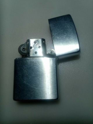 Zippo Lighter,  Chromed Brass Dated 2010,  Ideal Workhorse.  Would Polish Up