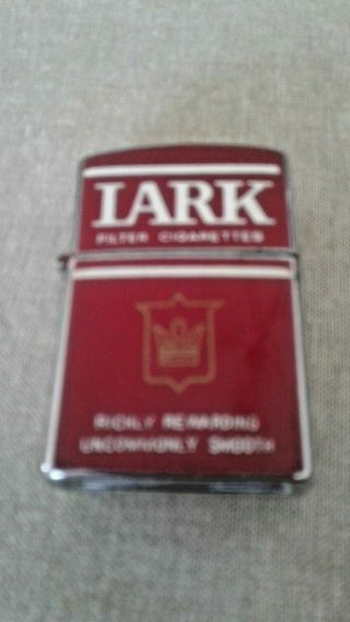 Lark (continental) Cigarette Windproof Flip Top Advertising Lighter Vintage