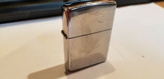 Zippo Cigarette Lighter 2011 Chrome With A Eagle On Front With Flint