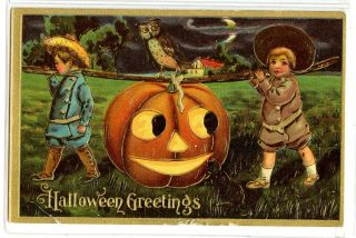 Halloween Postcard Vintage 1910 Boy & Girl Carry Jack O 