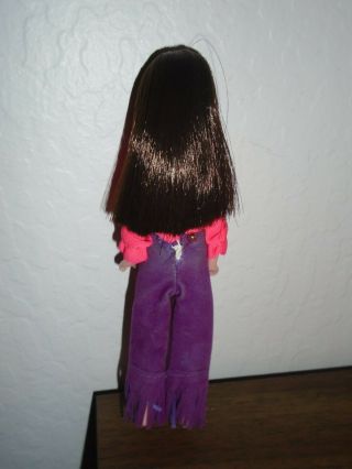 VINTAGE DAWN DOLL BY TOPPER WEARING A PINK TOP AND PURPLE FRINGED PANTS 2