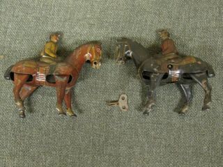 2 K900 Antique D.  R.  G.  M Germany Tin Wind Up Horse And Jockey Toys With One Key