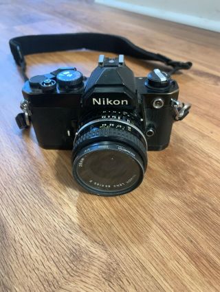Nikon Fm Vintage 35mm Slr Camera W/ Nikon E Series Lens And Promaster Uv Filter