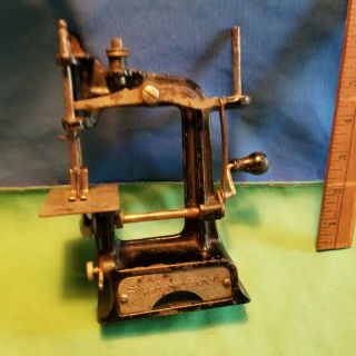 Antique Smith Egge Automatic Cast Iron Hand Cranked Toy Sewing Machine