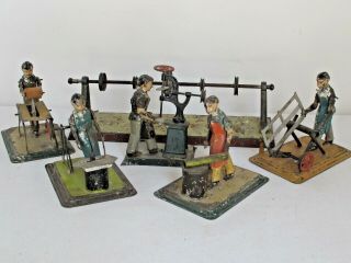 Set Of 5 Antique Hand Painted Tin Workmen German Steam Operated Toys.