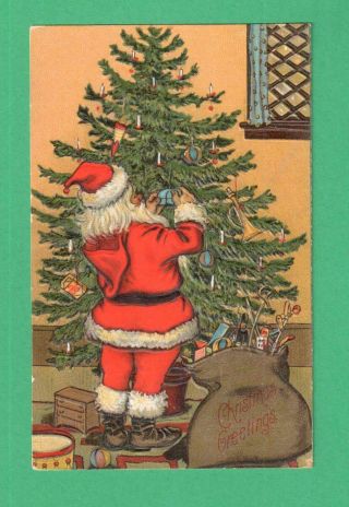 Vintage Christmas Postcard Santa Claus Trims Tree Candles Sack Toys