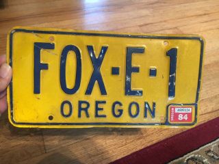 Vintage Vanity License Plate Oregon 1984 Fox - E - 1 Yellow Blue