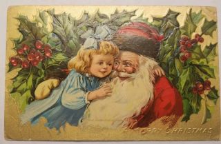 Vintage 1911 Postcard Santa Red Robe Holding A Little Girl With Blue Dress & Bow