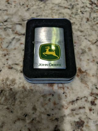 John Deere Zippo Lighter.  A Few Times