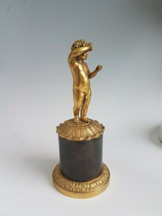 Antique Gilt Bronze Figure of a boy or Putti on bronze base. 3