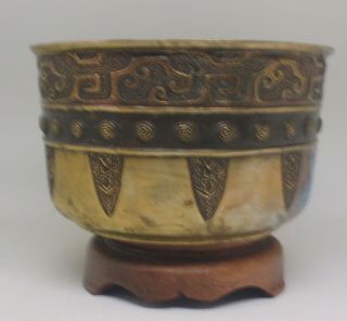 An Archaistic Chinese bronze bowl decorated in three bands 3