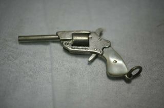 Vintage Nickel And Mother Of Pearl Revolver Pistol Charm Opens