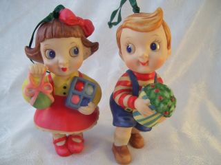 Set Of (2) Porcelain Christmas Ornaments Sweet Boy & Girl Bearing Gifts Vintage