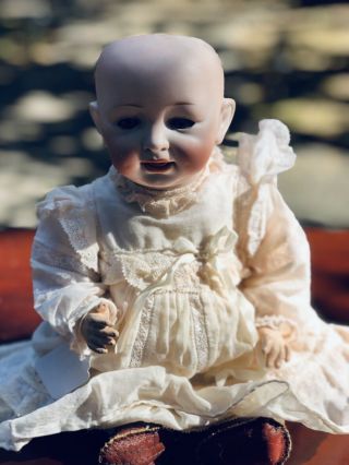 Louis Wolfe And Company Bisque Head Character Baby Doll.  15” 1870