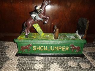 Vintage Show Jumper Cast Iron Mechanical Coin Bank