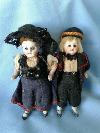 Antique Pair German All Bisque Mignonette Dolls Glass Eyes