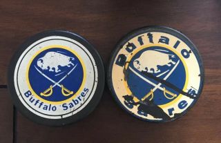 (2) Vintage Nhl Buffalo Sabres Hockey Pucks