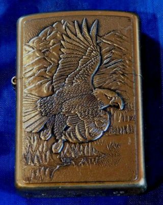 Zippo Brass Lighter With Flying Eagle In Relief