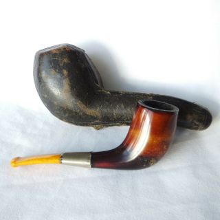 An antique,  smooth bowled Meerschaum pipe with an amber mouth piece 2