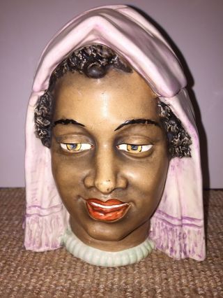 Antique Majolica Tobacco Jar Of A Black Woman Wearing A Long Head Scarf.