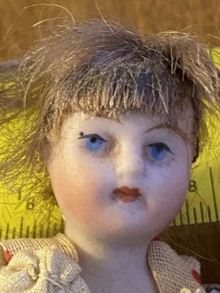 ANTIQUE KLING? 3.  5” BISQUE DOLL ALL PAINT IS 2